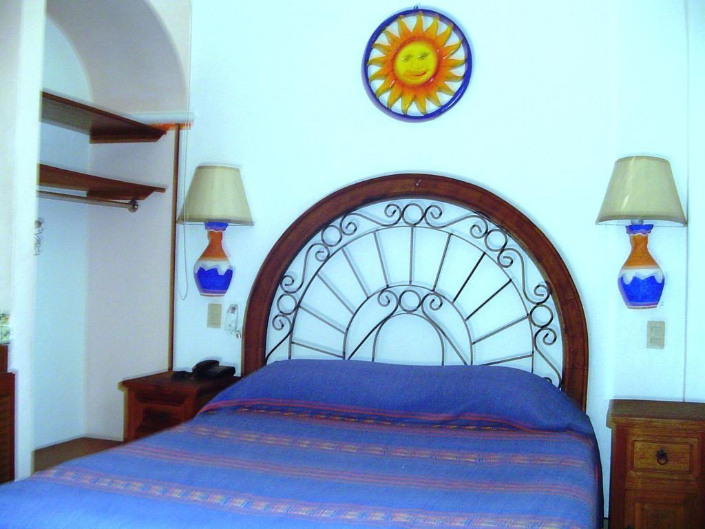 Hotel&Suites Coral Puerto Vallarta Pokoj fotografie
